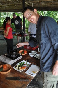 Dave, working the Asian cooking utensil of choice:  chopsticks.