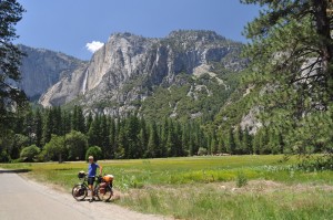 Also in Valley, Dave pauses for a photo with Yosemite Falls cascading from the mountain behind.