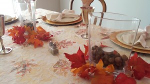Acorns from the yard into vases with a tea light... and voila! Beautiful Thanksgiving centerpieces. We tried to enjoy the opportunity for craftiness!