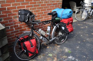A picture of Dave's bike and bright red panniers on the day we left.