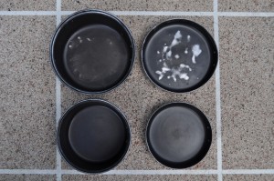 The wear is particularly evident in the bigger pot and its lid (top), as the smaller pot was often protected from daily damage because it packed inside the bigger one. The lid is mostly worn from contact with the other lid that nestled inside it during travel.