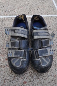 You can see how the backs of the shoes are worn out, but you probably can't see the rip that spans from in between the Velcro straps all the way to the sole of the shoe. They've been through it!