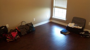 Suitcases serving as our dressers in the master bedroom. 