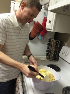 Dave, mixing up the apples with plenty of sugar for the pie filling