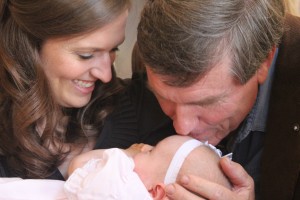 After the service, getting kisses from Granddaddy (my dad).