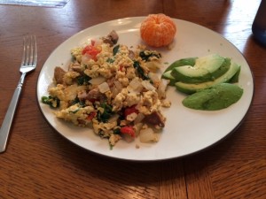 Breakfast day 1: lots of food! Eggs and sausage and veggies and avocado and mandarin! Yum!